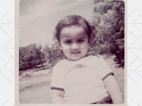 sepia-toned photo of Manesh Patel as a small child