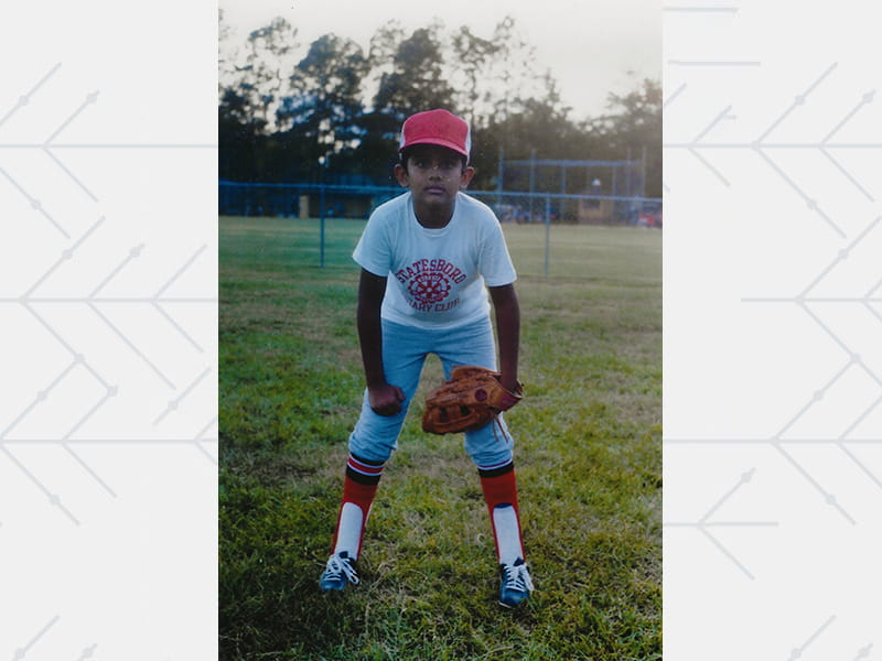 Manesh Patel as a child playing Little League baseball in Statesboro, Georgia
