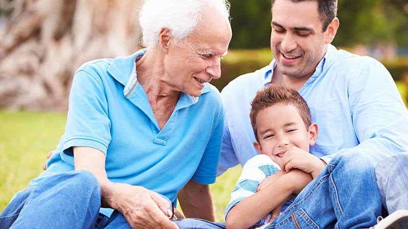 generational male family playing outdoors