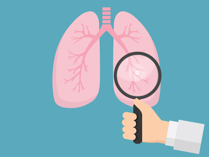 illustration of a hand holding a magnifying glass looking at a pair of lungs