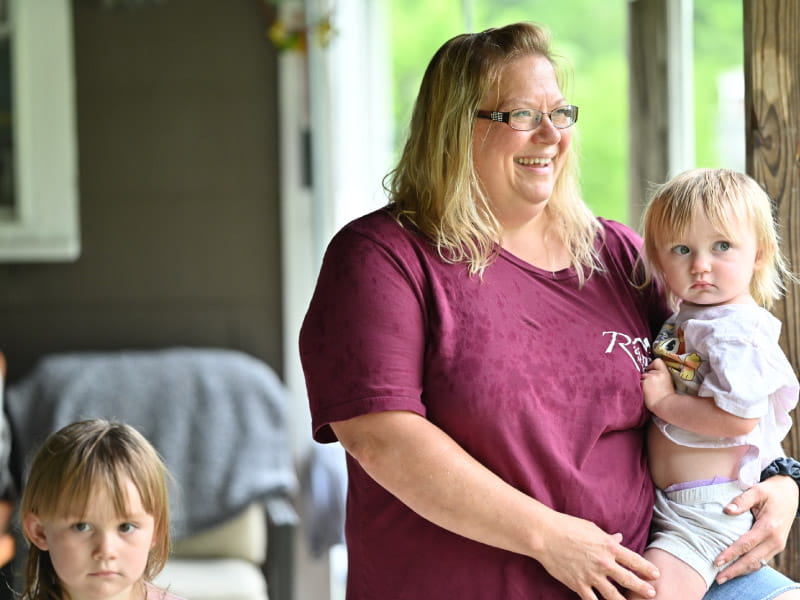 Sabrina Ford, with her granddaughters McKenna (left) and Annslea, is the director of nursing at Rainelle Medical Center, the town’s only clinic. (Photo by Walter Johnson Jr./American Heart Association)