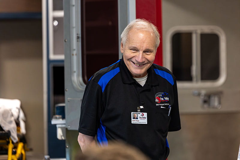 Karl Arps returns to his EMT classroom nearly three months after his cardiac arrest.