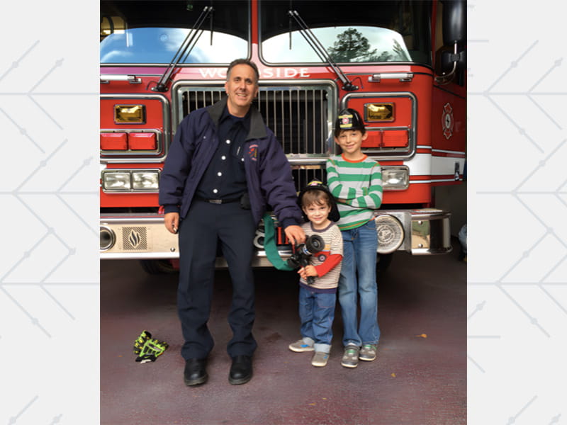 Charlie and Elliot Gorelick visiting Steve at his fire station in 2016.