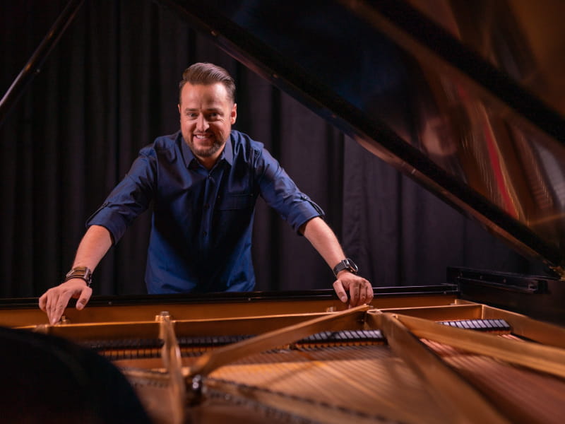 Pianist Paul Cardall was born with a congenital heart defect, and he now heals others' hearts through his music. (Photo by Erin Morris Huttlinger)