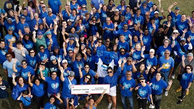 Large group photo of Blue Cross Blue Shield of Texas employees volunteering at the 2026 Dallas Heart Walk