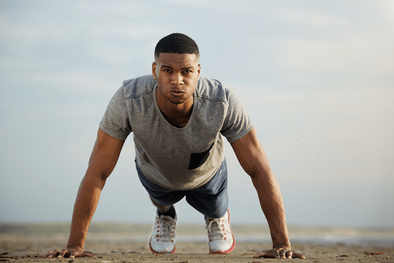 Young man exercising outside