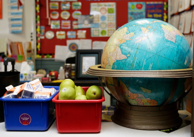 View of a classroom with a focus on a globe