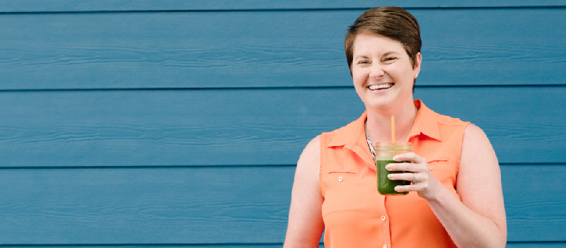 woman drinking smoothie